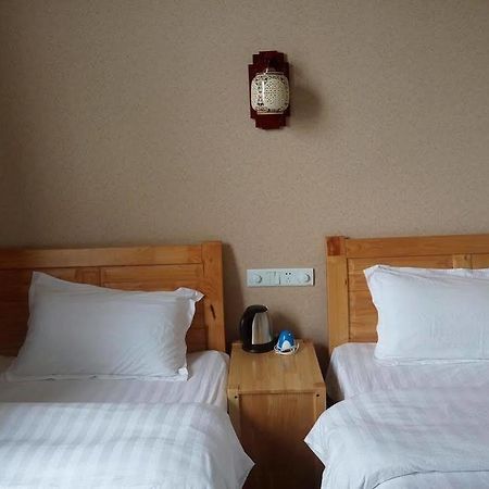 Shuanglang Jinxiangyuan Hotel Tali Suanglang Kültér fotó