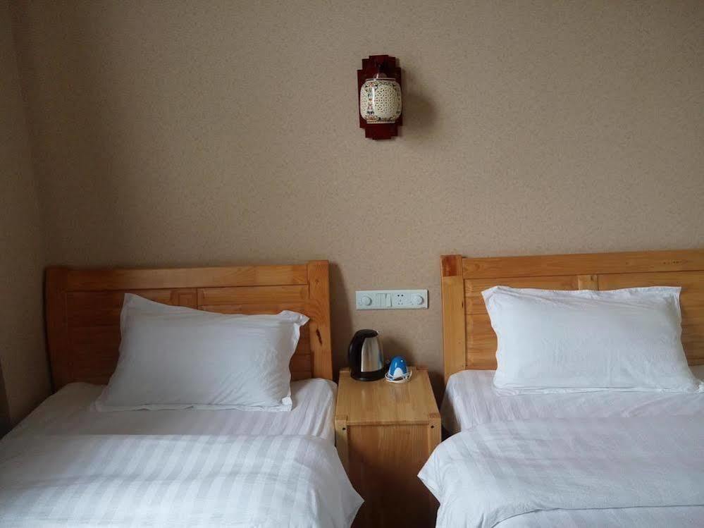 Shuanglang Jinxiangyuan Hotel Tali Suanglang Kültér fotó