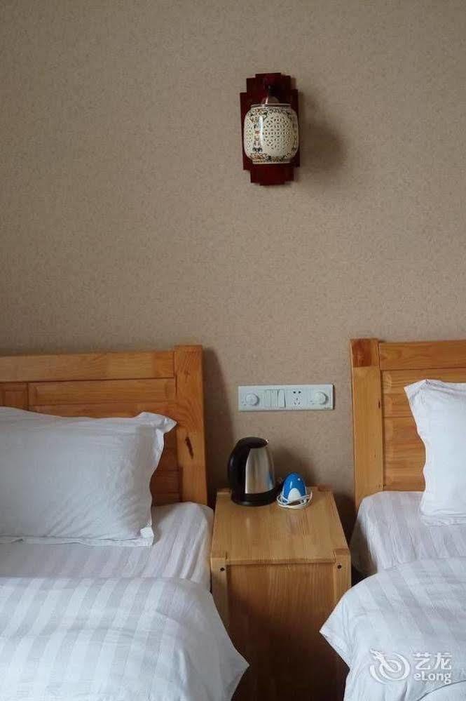 Shuanglang Jinxiangyuan Hotel Tali Suanglang Kültér fotó